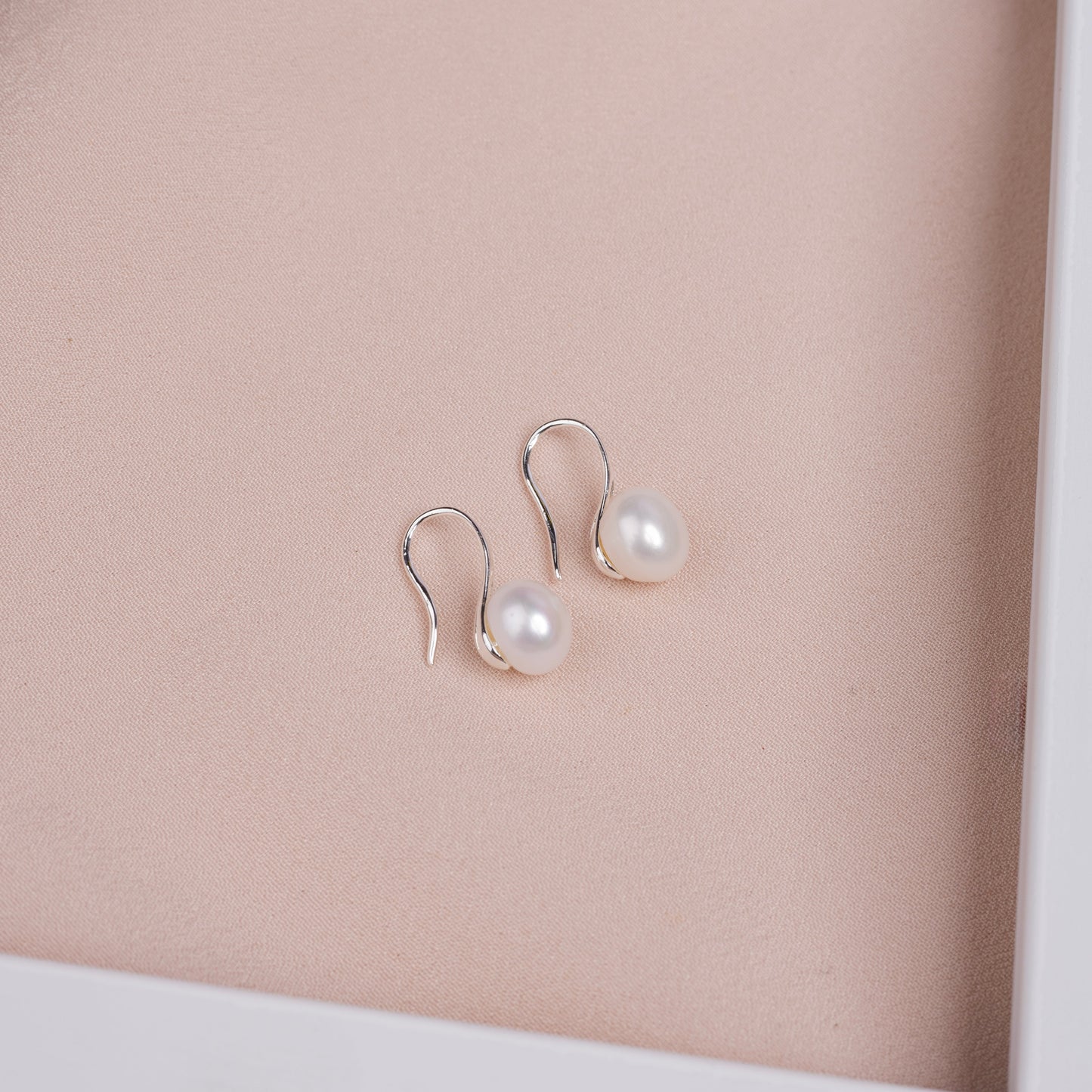 Silver pearl earrings