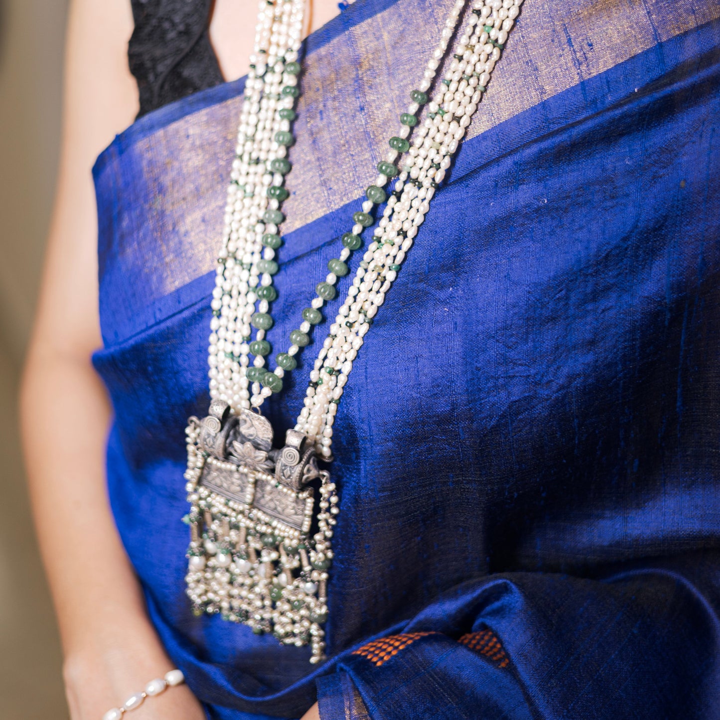 Long silver pearl necklace
