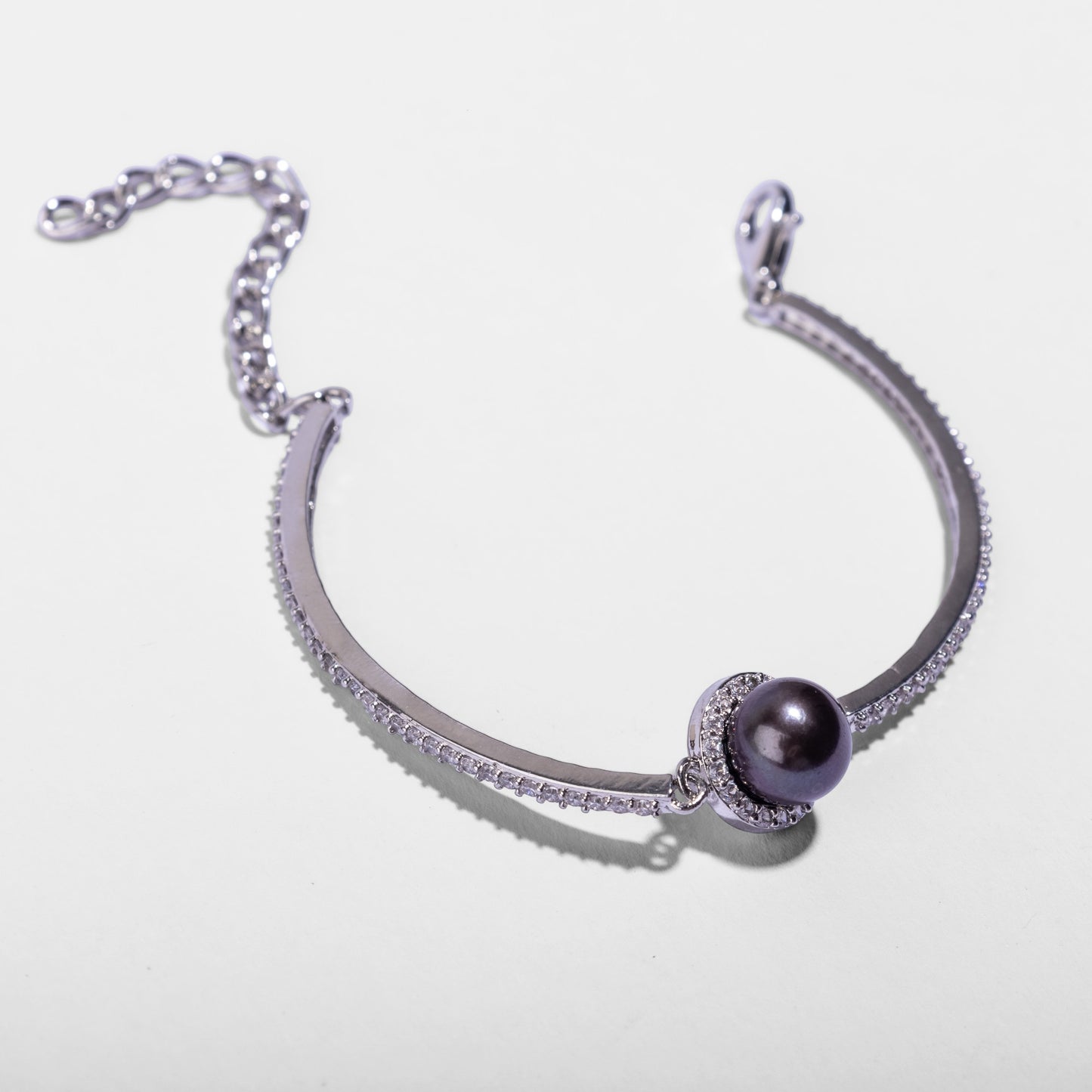 Diamond bracelet with a black pearl