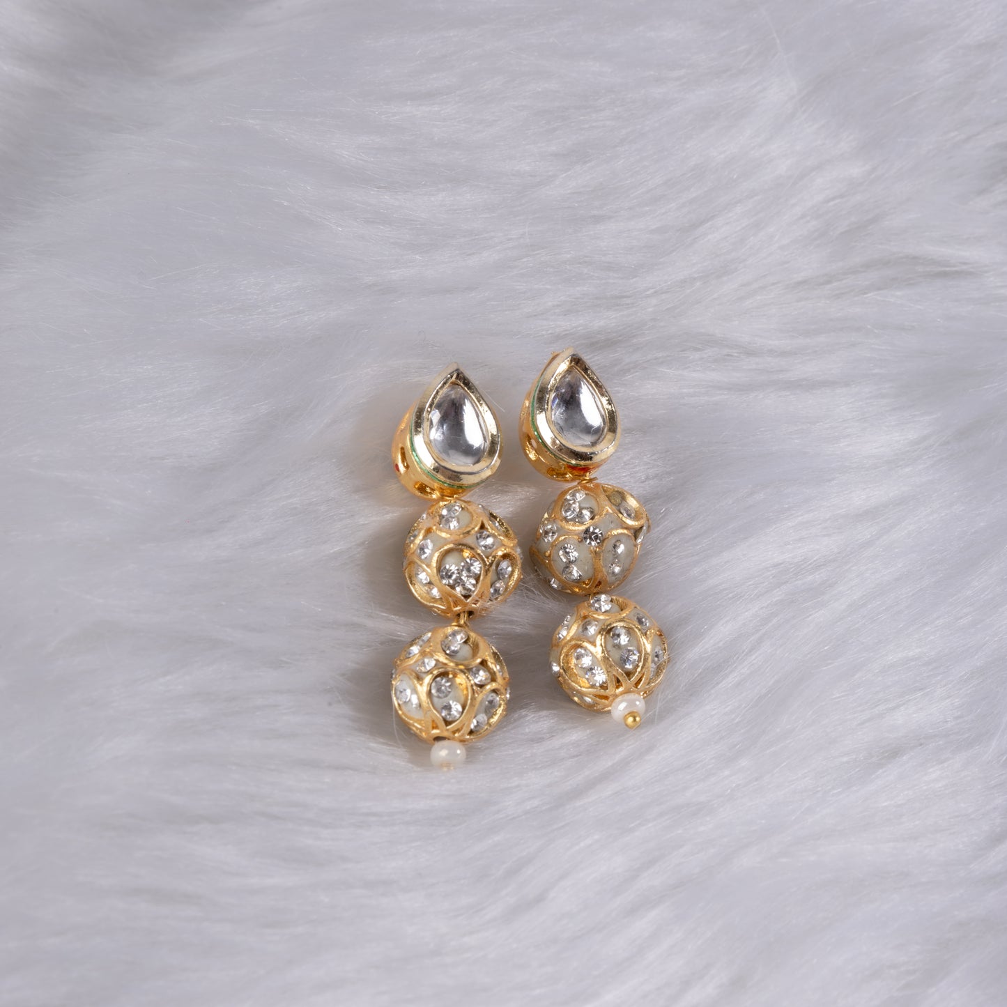 Gold earrings with American Diamonds