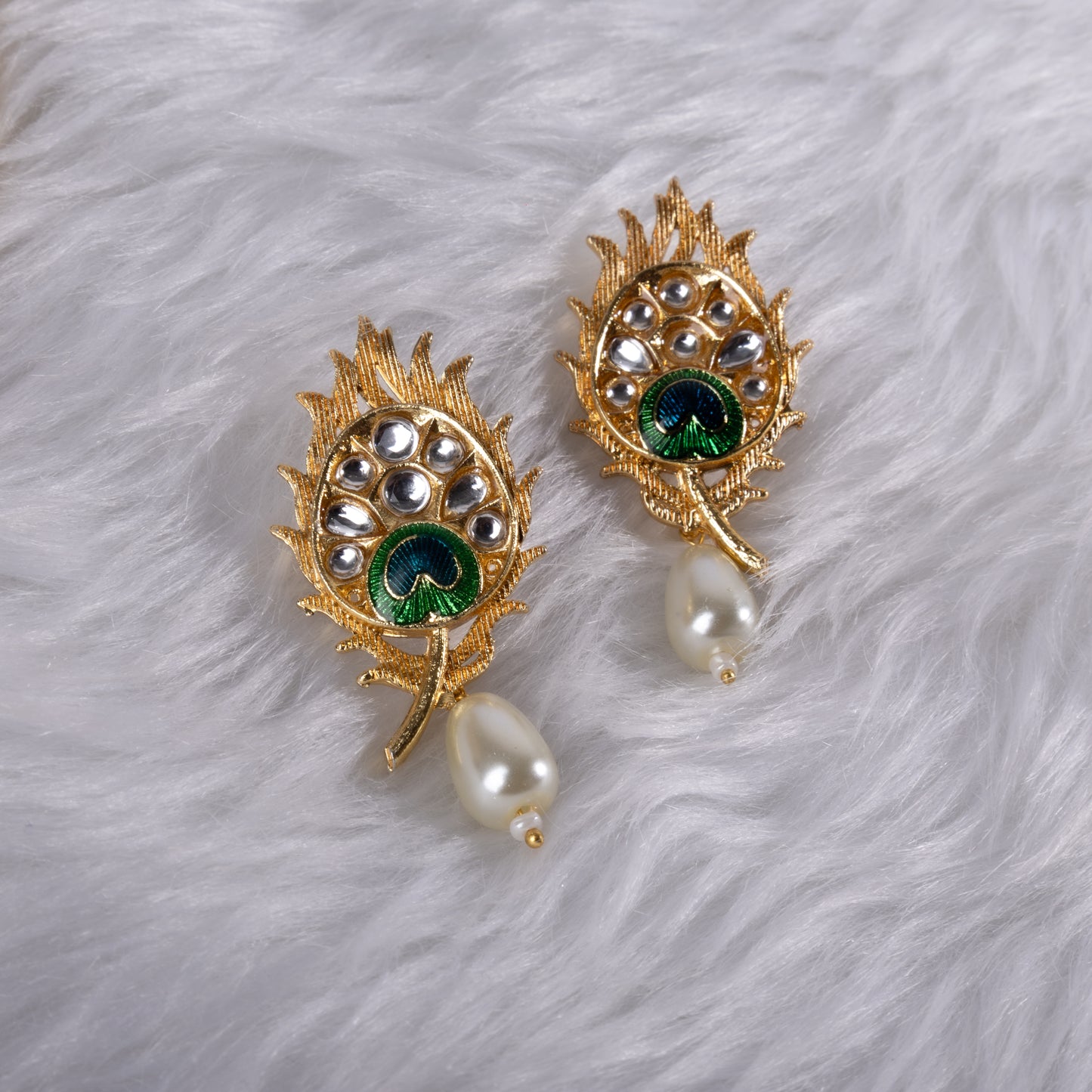 Gold earrings with green gemstones and pearl drops