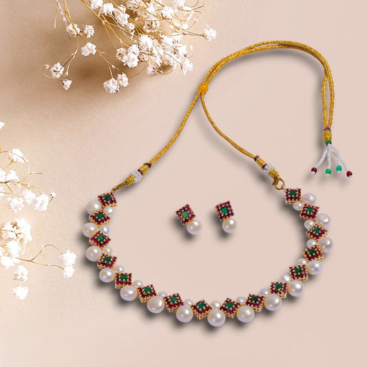Pearl necklace with gemstone accents and matching earrings