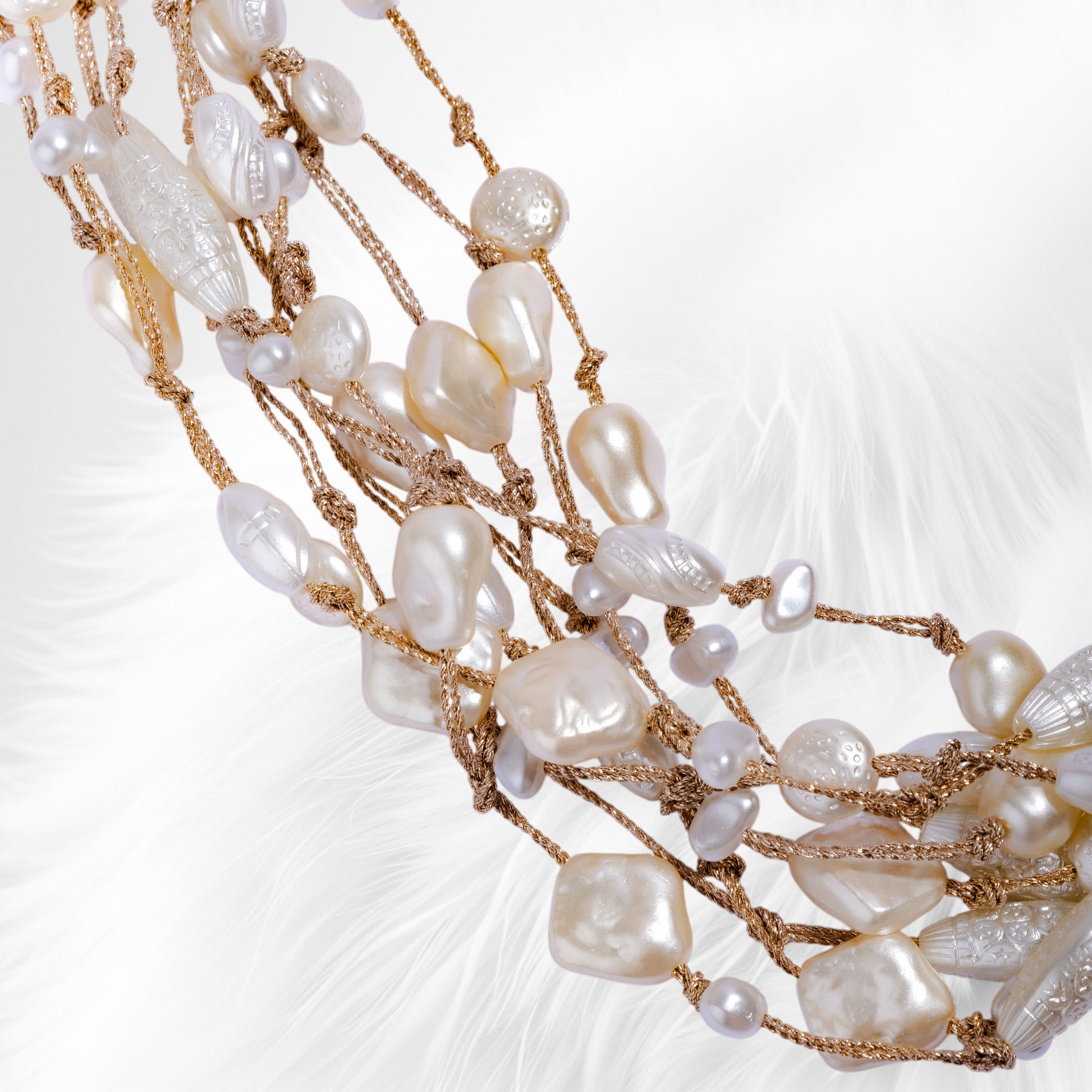 Multilayer Pearl necklace with gold accents 