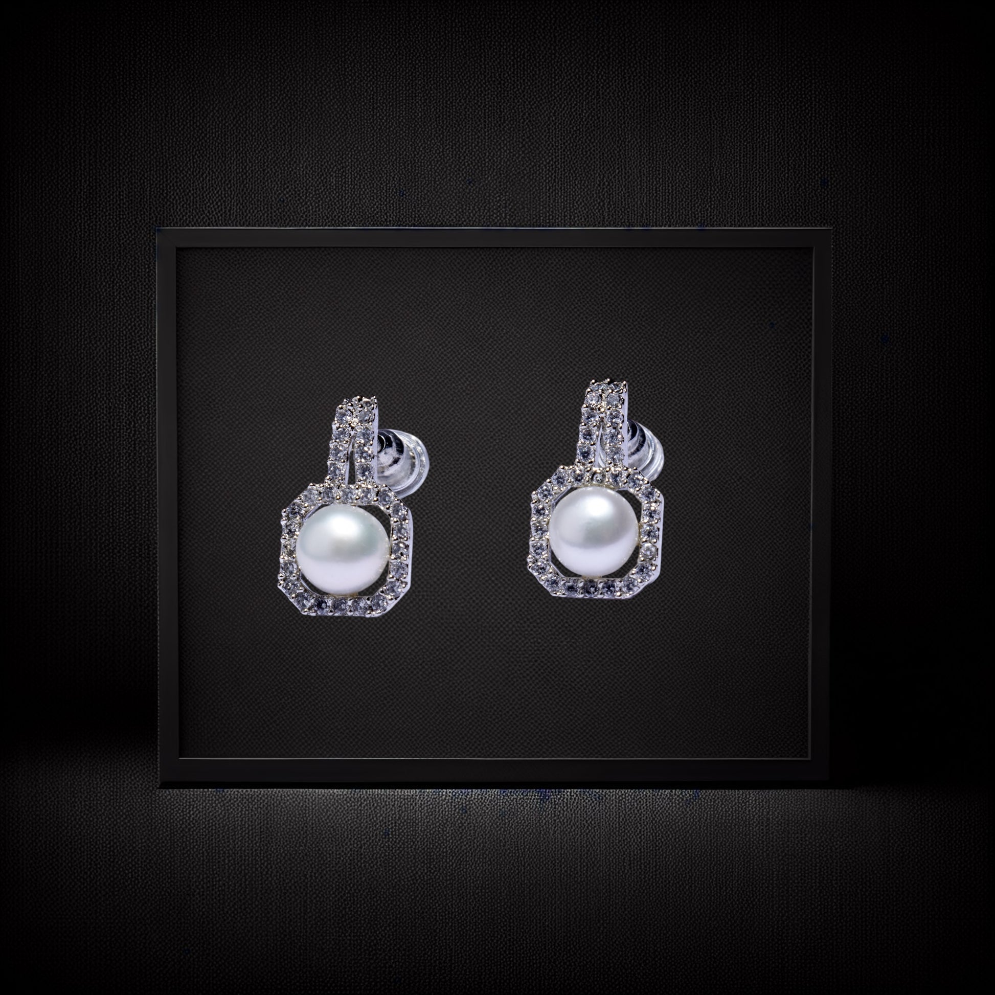 Diamond  pearl earrings with silver accents 