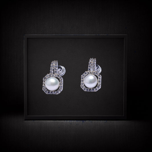 Diamond  pearl earrings with silver accents 