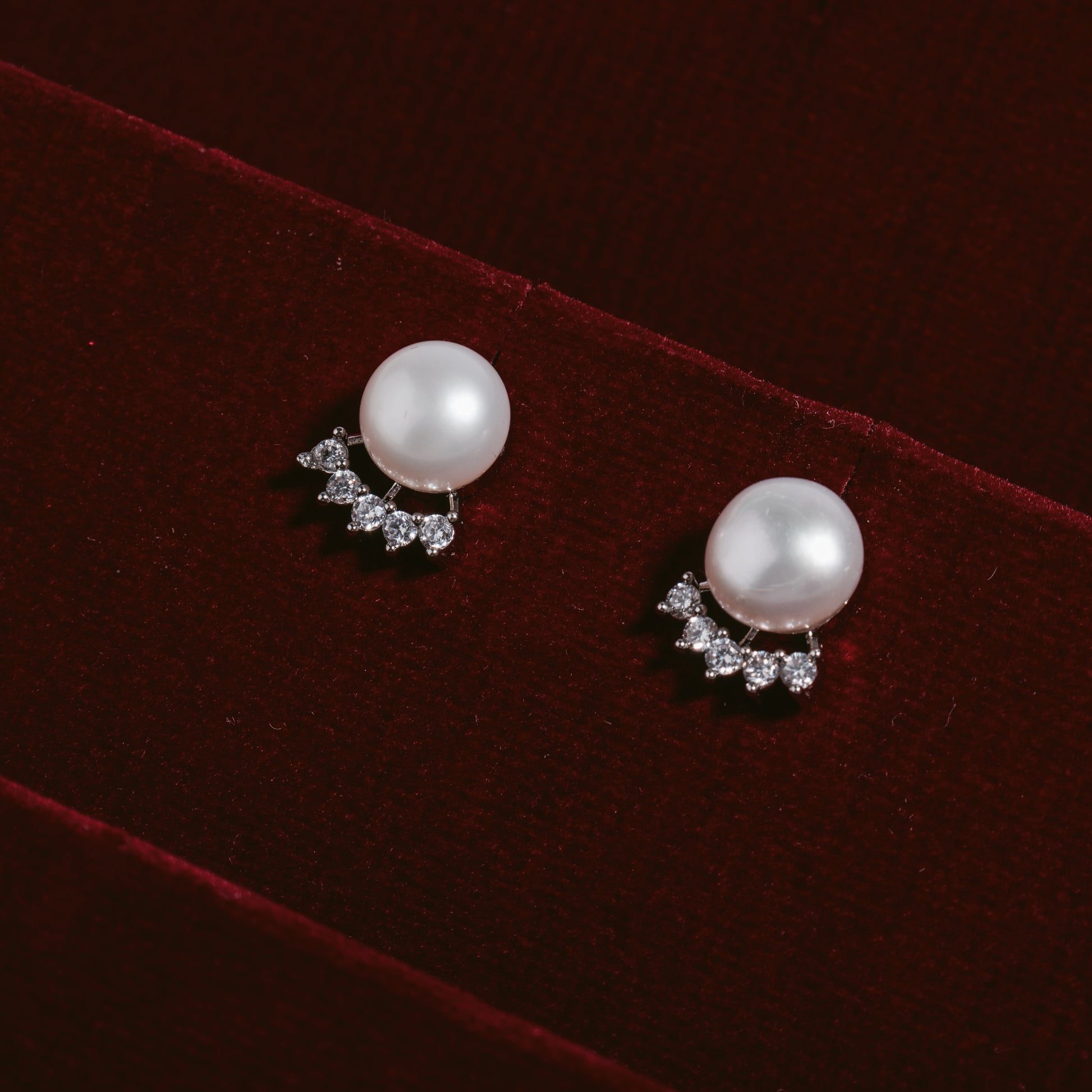 Pearl earrings with diamond accents 