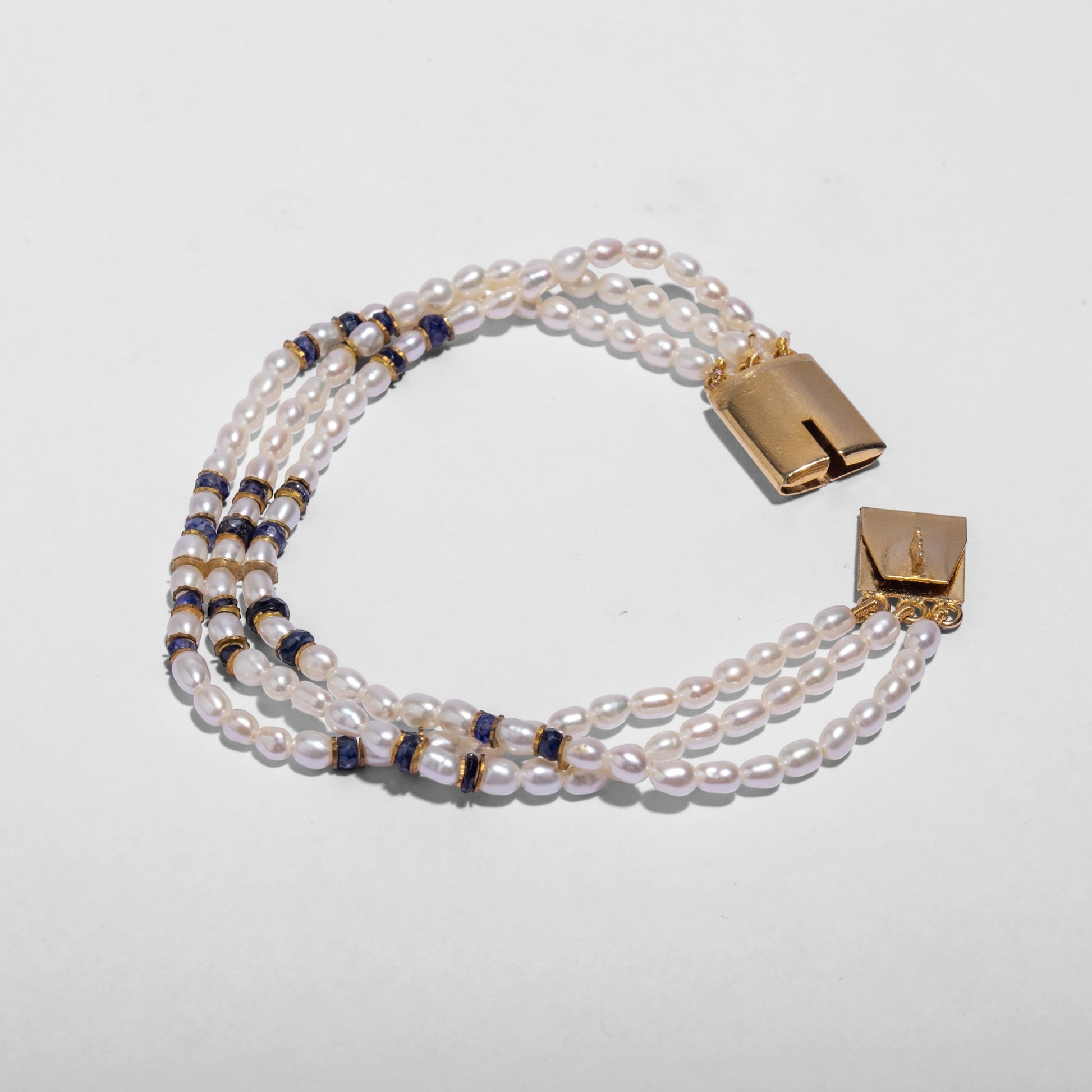 Rice Pearl bracelet with gold and blue accents 