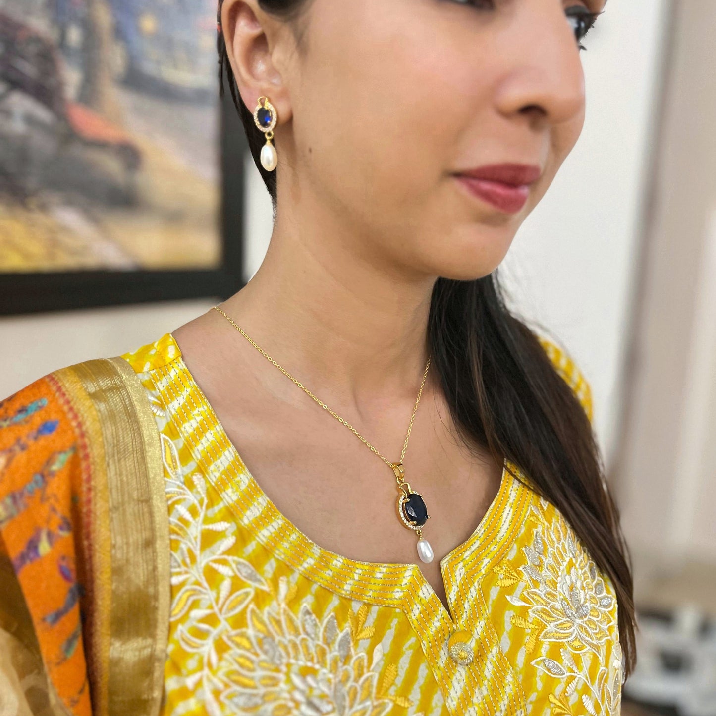 Pearl Pendant set with gemstone