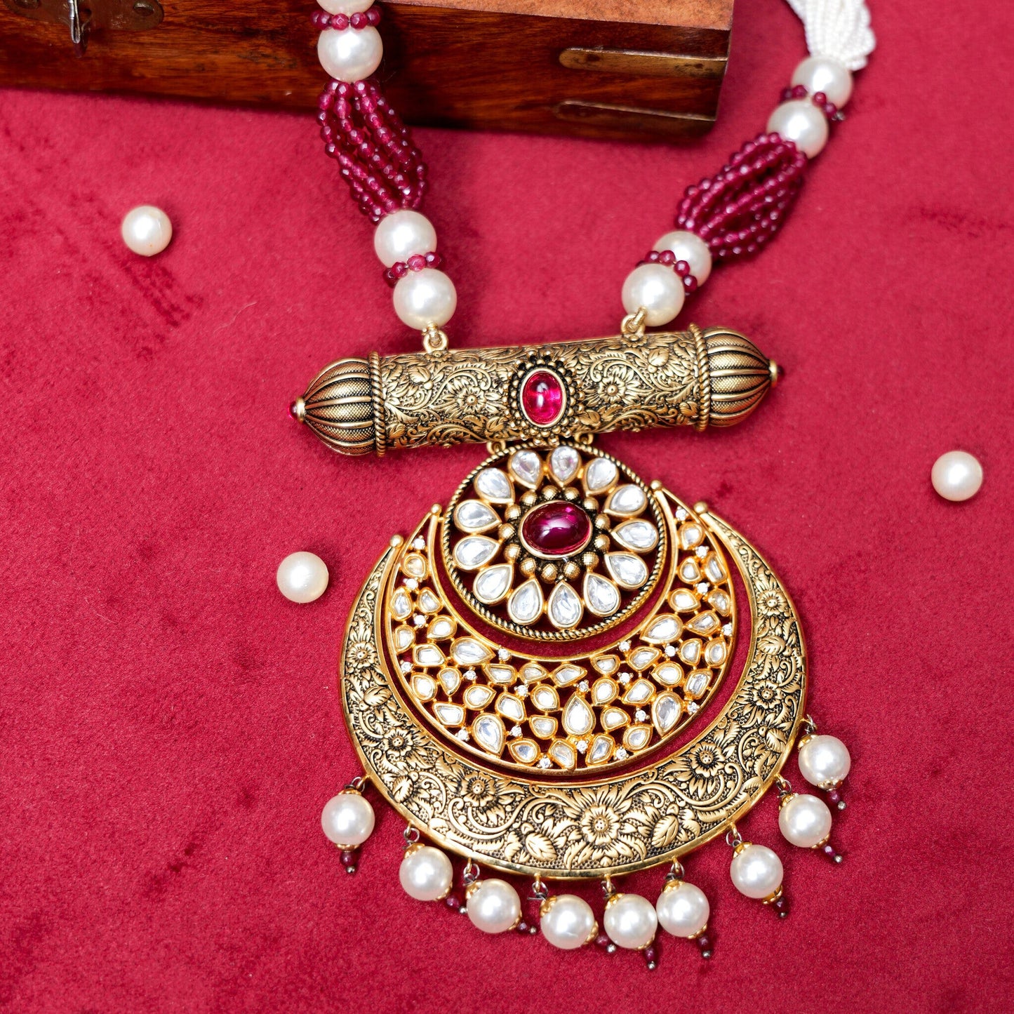 Kundan gold necklace with red gemstone 