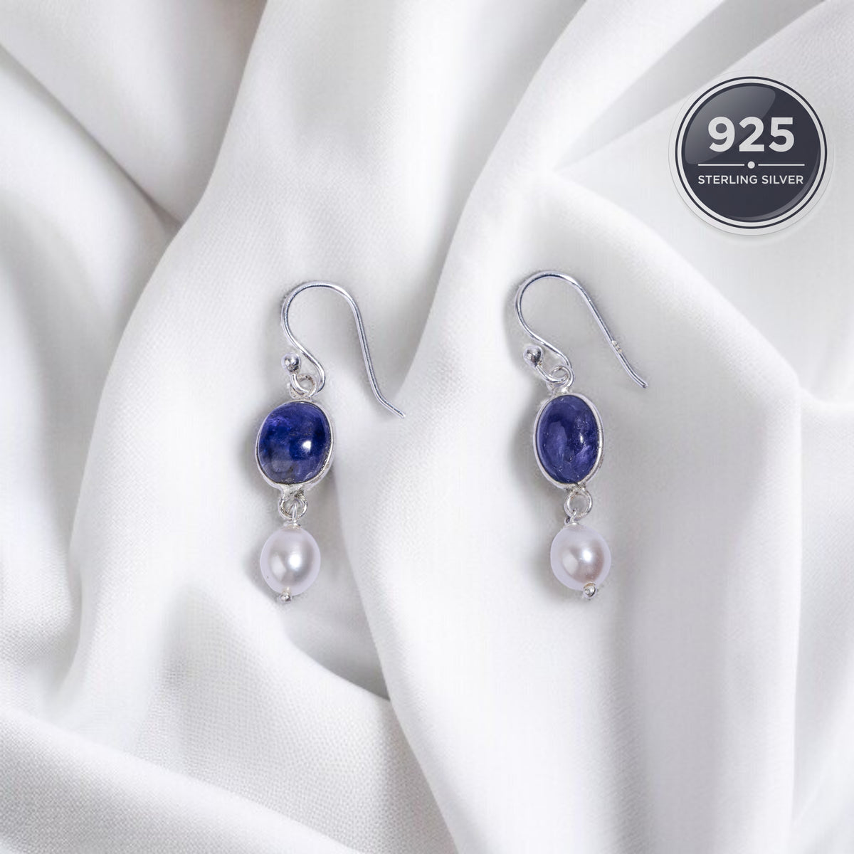Silver earrings with blue tanzanite gemstones and pearls 