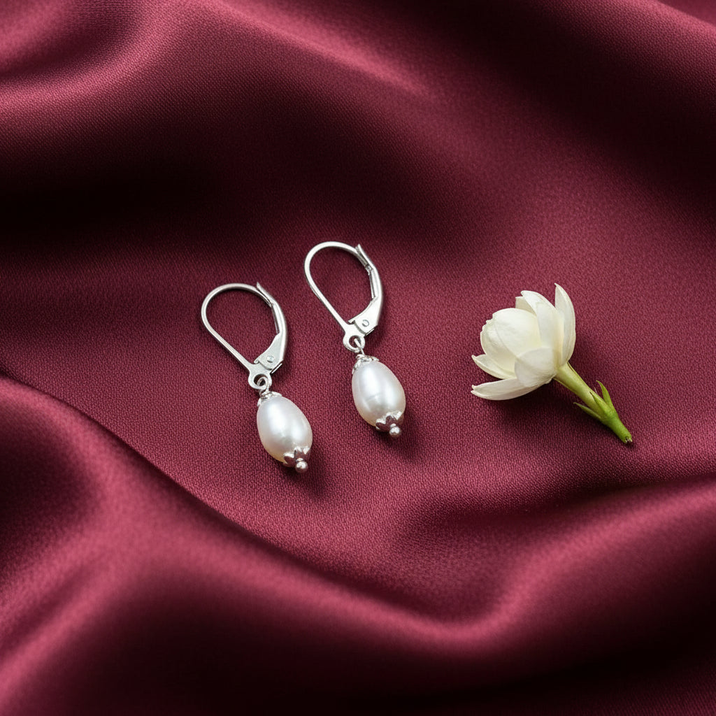 Silver earrings with pearl drops