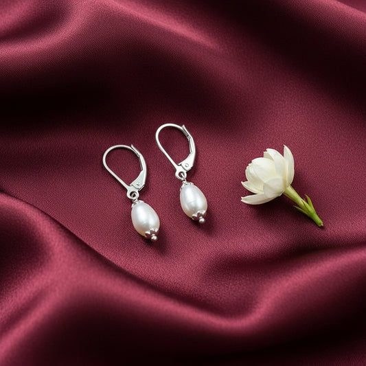 Silver earrings with pearl drops