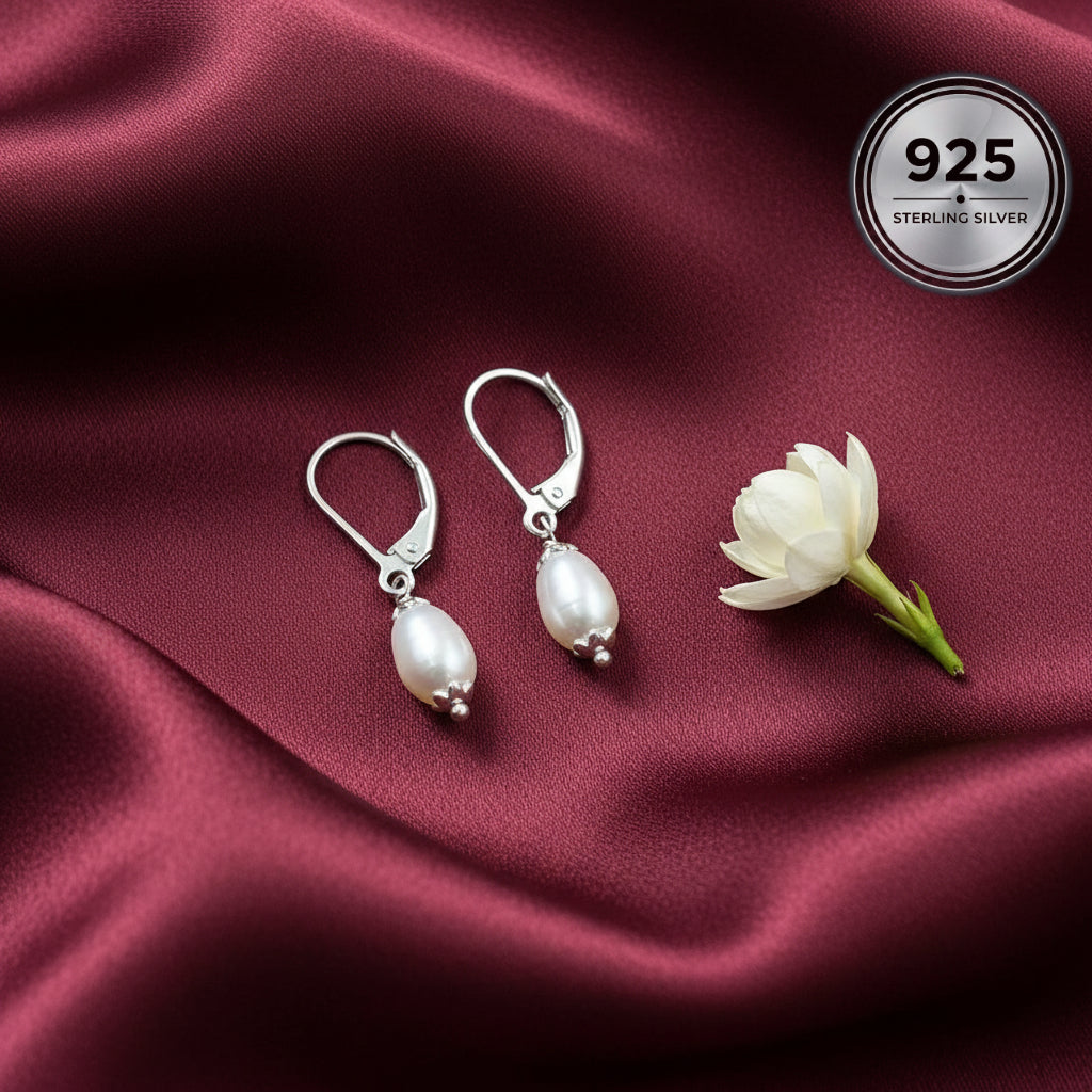 Silver earrings with pearl drops