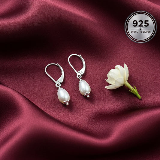 Silver earrings with pearl drops