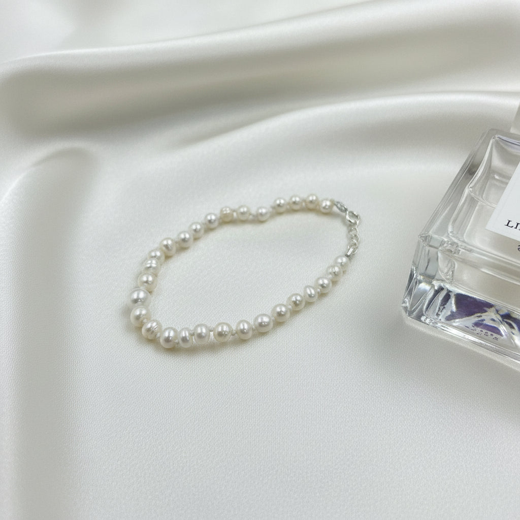 Bella Freshwater Pearl Bracelet handcrafted with genuine freshwater pearls for girls and teenagers.