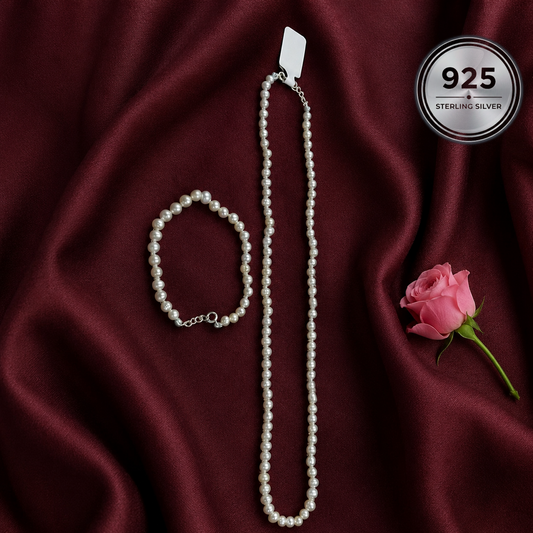 Bella Pearl Set featuring a genuine freshwater pearl necklace and matching bracelet displayed together.