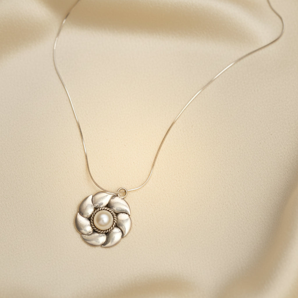 925 sterling silver floral pearl pendant with a genuine freshwater pearl on a silver chain.