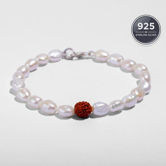 Handcrafted freshwater pearl bracelet featuring a genuine Indonesian Rudraksha bead.