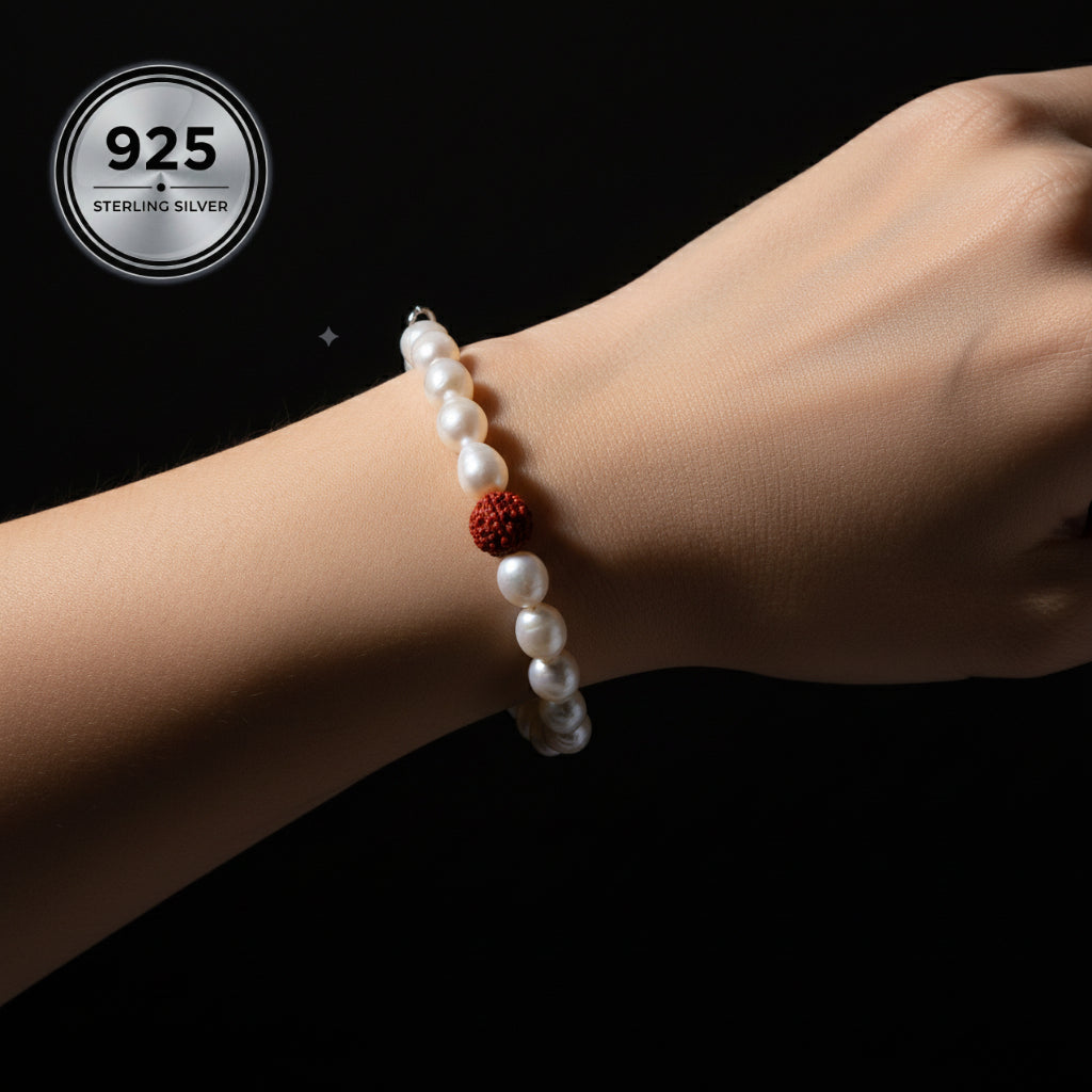 Woman wearing the Divine Pearl Bracelet with freshwater pearls and Indonesian Rudraksha